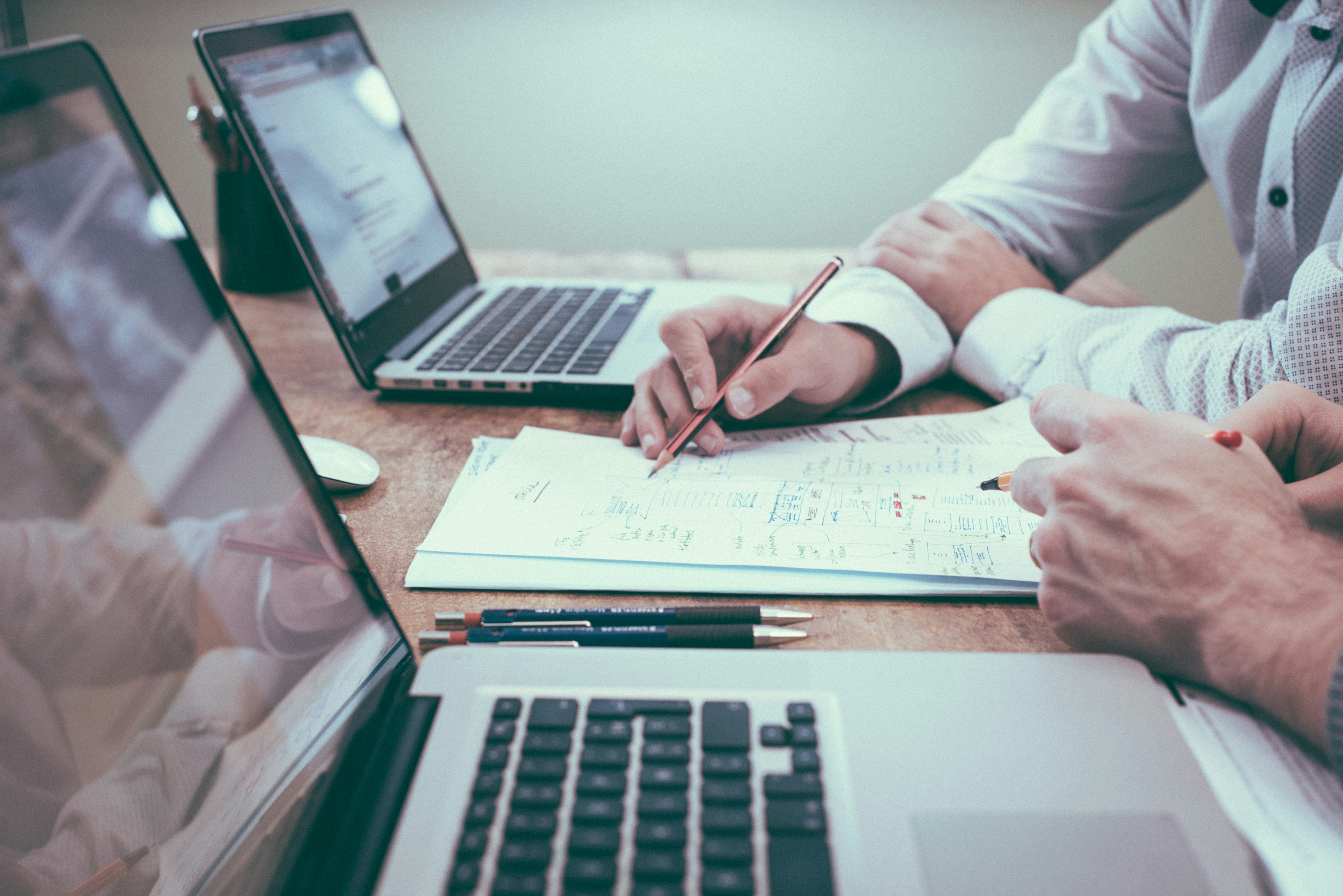 Healthcare professionals reviewing documents together