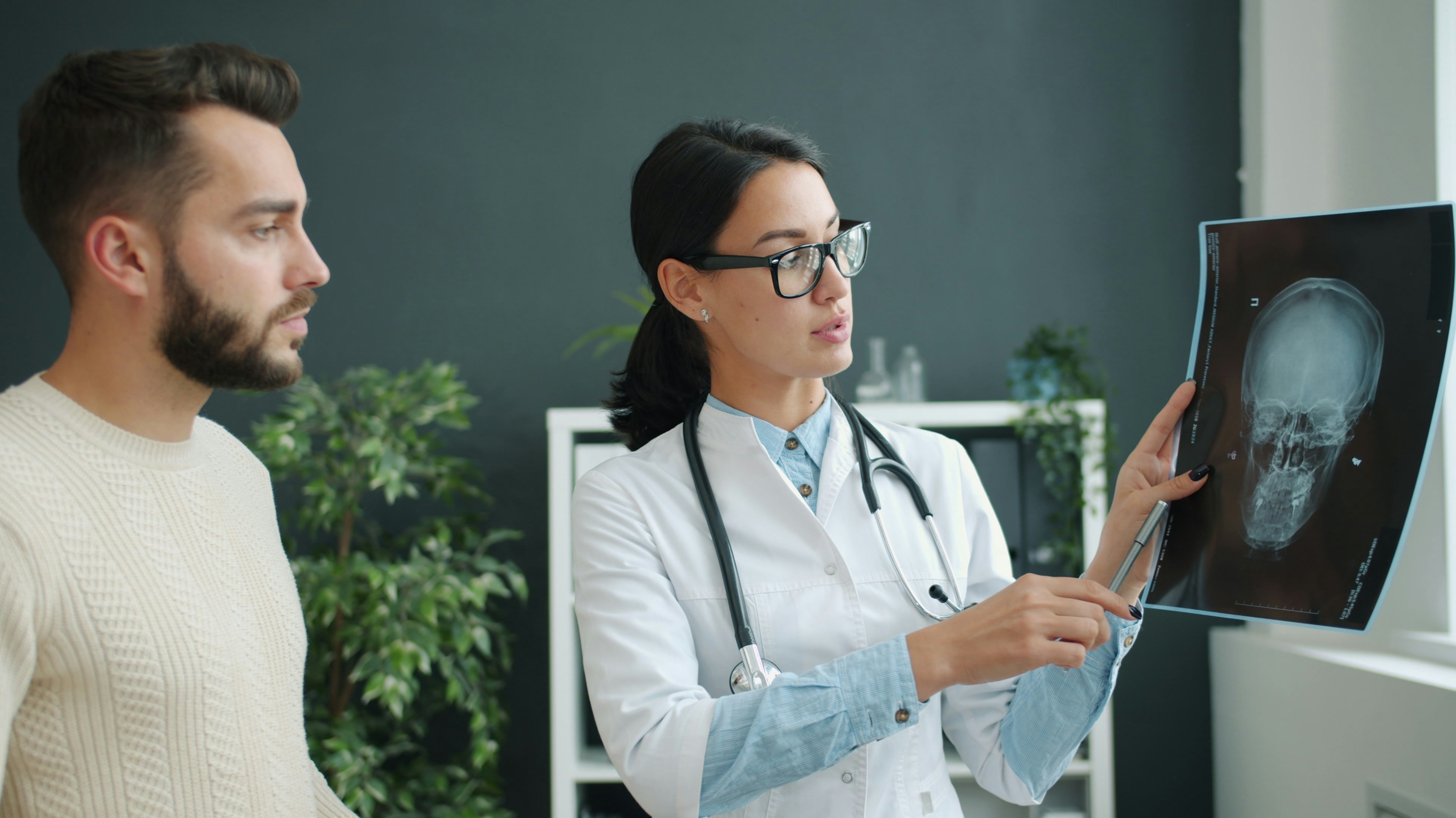 Radiologist reviewing a diagnostic scan